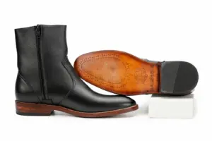 Leather sole on men's black side-zip ankle boot