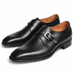Black leather single monk strap dress shoes for men, pair view