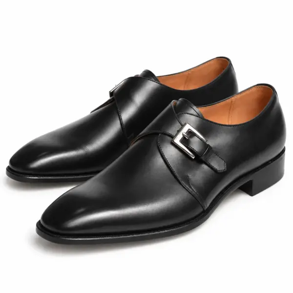 Black leather single monk strap dress shoes for men, pair view