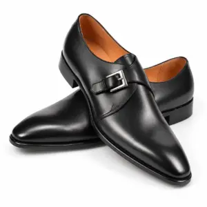 Black leather single monk strap dress shoes for men, three-quarter view