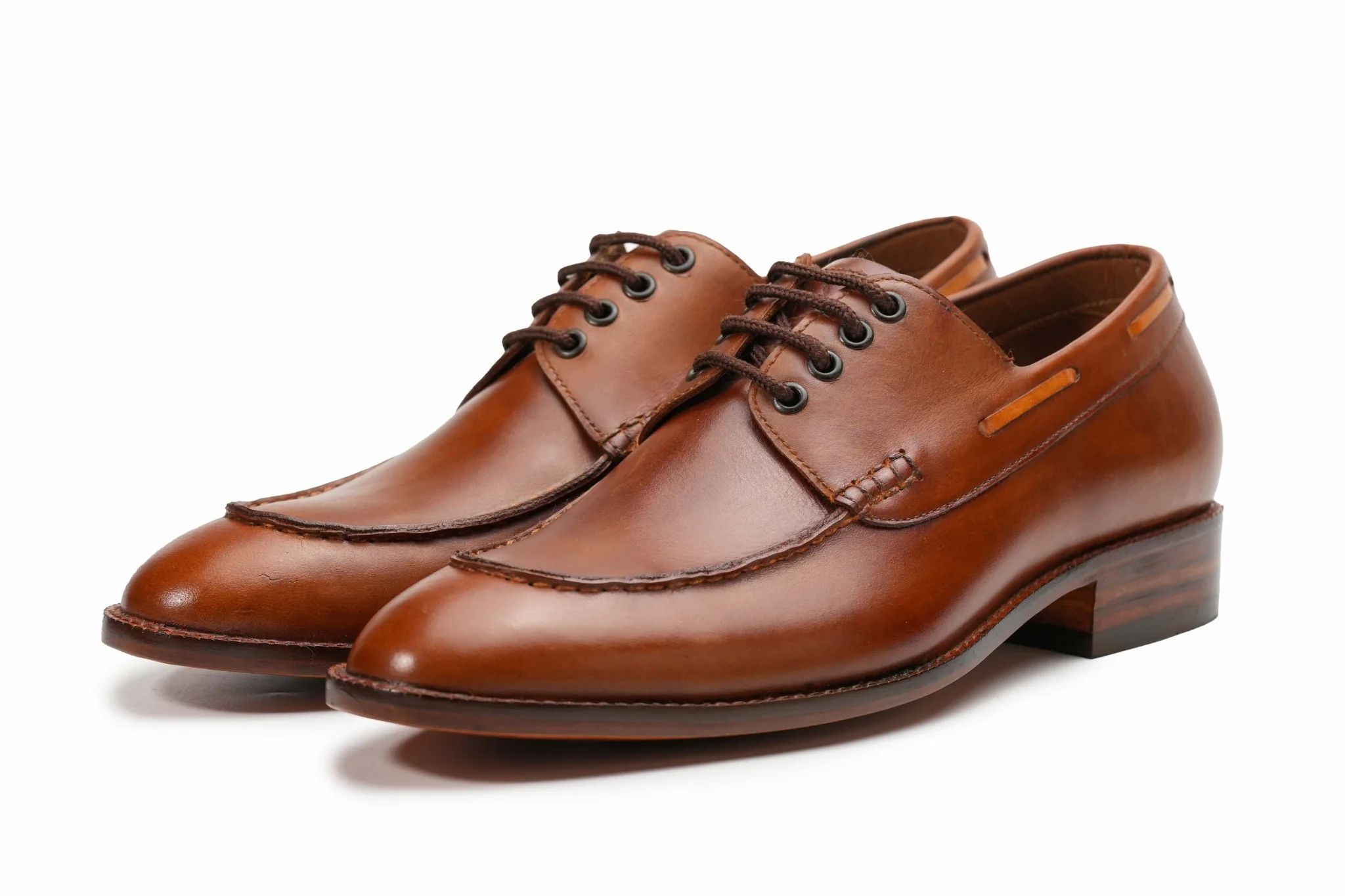 Brown leather Derby shoes by Handsole showing open lacing with the quarters over the vamp
