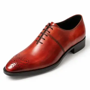 Angled view of the burgundy Oxford shoe showing medallion toe detail and leather finish