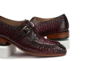 Burgundy Croc-Embossed Single Monk Strap Shoe — three-quarter view