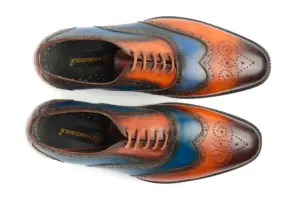 Top view of cognac and blue patina full brogue Oxford shoes with Handsole insoles