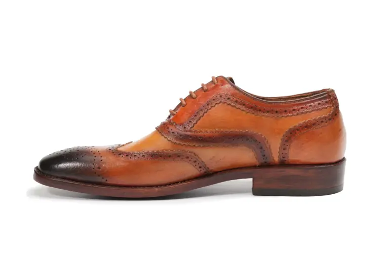 Cognac brown full brogue Oxford shoes showing wingtip perforation and decorative broguing