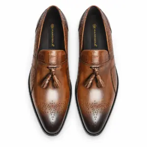 Cognac croc-embossed tassel loafers for men, top view