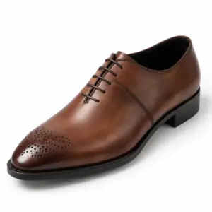 Angled view of the dark brown Oxford dress shoe with almond-shaped medallion toe