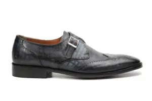 Buckle side view of grey-black patina single monk strap shoe