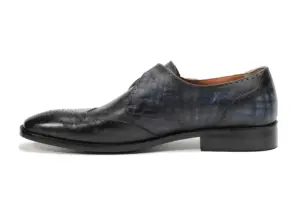 Opposite side profile of grey-black patina single monk shoe