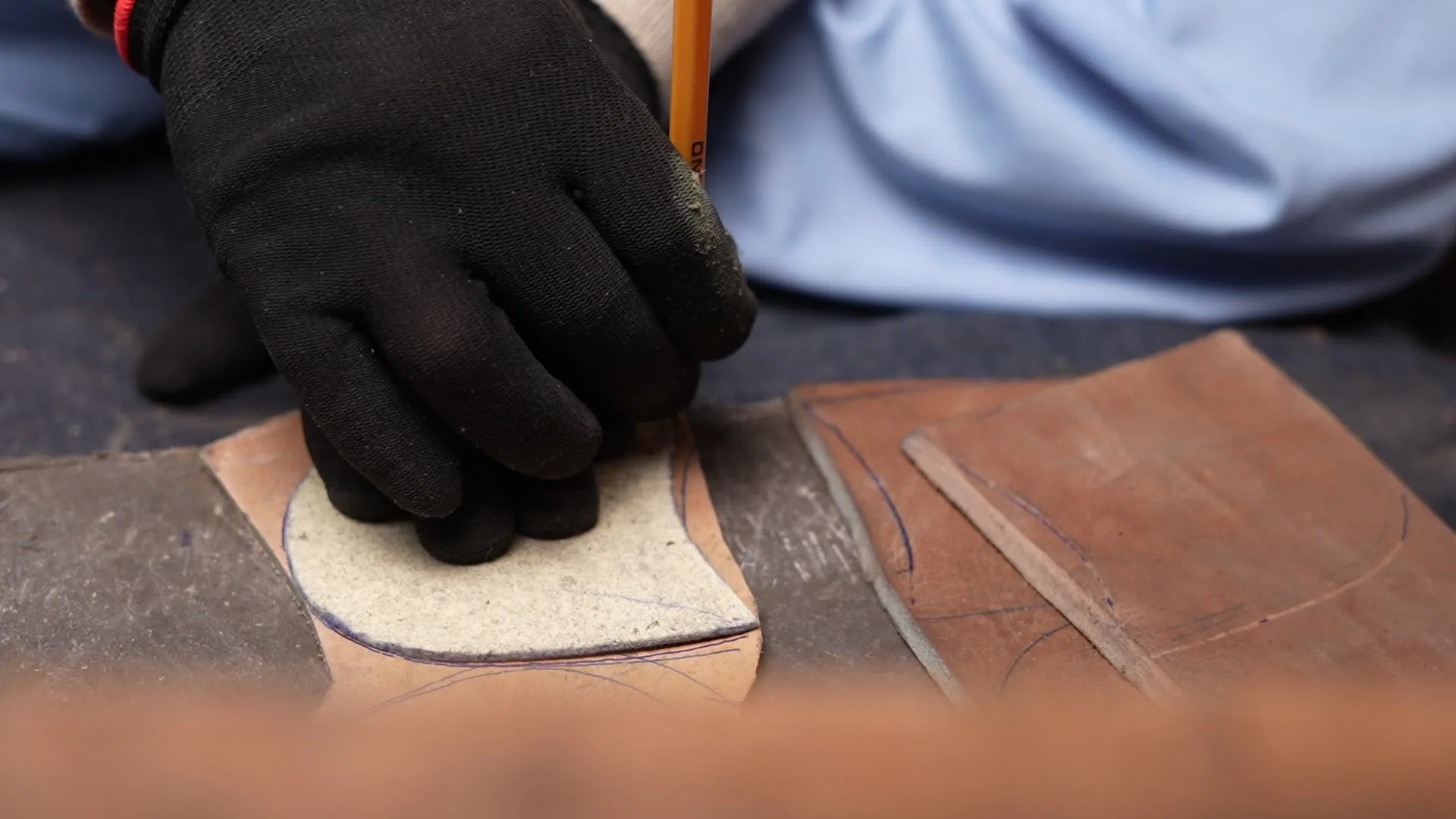 Handsole workshop heel and sole construction showing the lower structure of a leather shoe