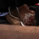 Handsole workshop bottom preparation during leather shoe construction