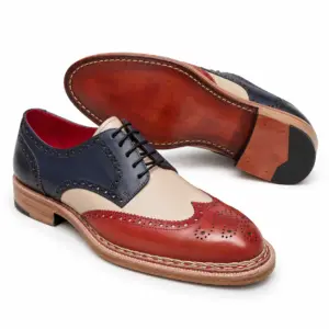 Navy, cream and rust wingtip brogue Derby shoe for men, leather sole view