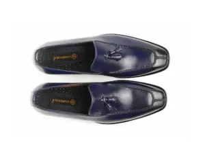 Overhead view of purple-black tassel loafers with Handsole insoles