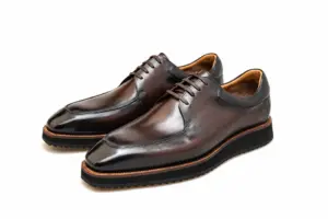 Brown hand-painted apron-toe Derby shoes with padded collars and brown welt edges, pair