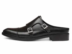 Buckle-side profile of a black cap-toe double monk mule with a low raised rear rim