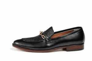 Opposite profile view of black chain apron loafer showing smooth leather quarters