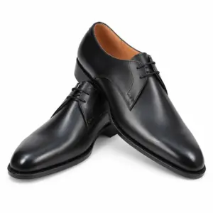 Men's black formal Derby shoes with a burnished finish and round toe, three-quarter view