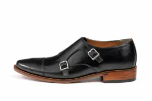 Buckle-side profile of black leather double monk strap shoe