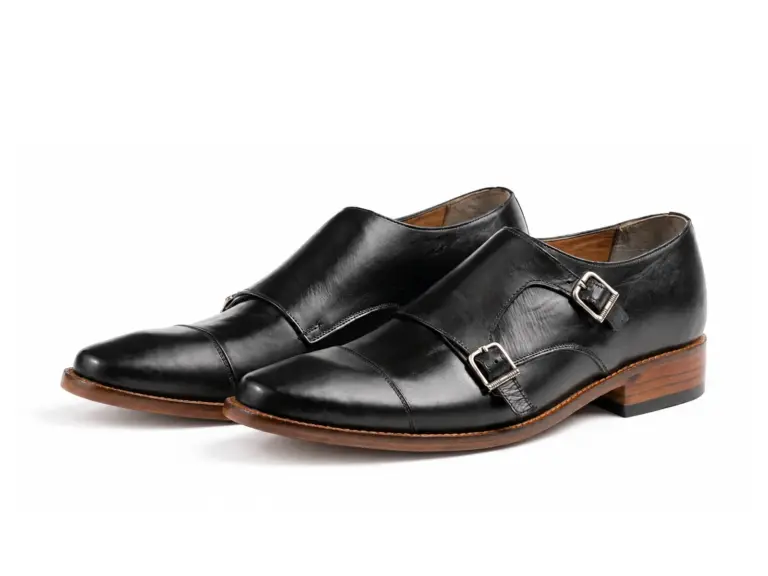 Pair of black leather cap-toe double monk strap dress shoes