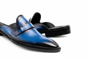 Blue-Black Striped Patina Penny Mule: penny strap detail showing Blue leather penny strap and Blue-Black Striped Patina.