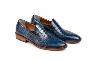 Three-quarter pair view of blue textured leather plain loafers