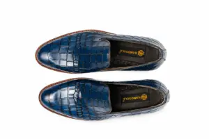 Top pair view of deep blue croc-pattern plain loafers