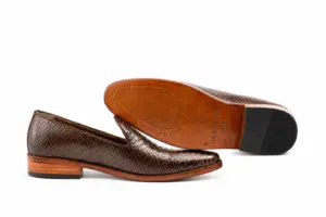 Brown Lizard-Pattern Almond-Toe Wholecut Loafer: leather sole profile showing the brown outsole and dark heel.