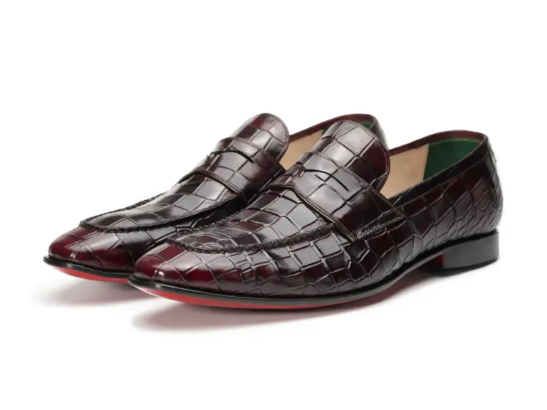Burgundy Croc-Embossed Penny Loafer — three-quarter view