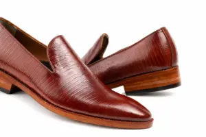 Burgundy Fine-Texture Wholecut Loafer: fine texture detail showing Wholecut vamp without decorative hardware and Burgundy Fine-Texture Leather.