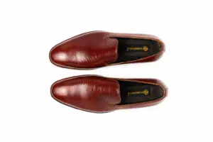 Burgundy Fine-Texture Wholecut Loafer: overhead pair showing the toe shape, instep opening and branded footbed.