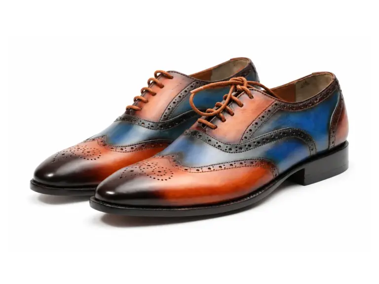 Pair of cognac and blue patina full brogue wingtip Oxford shoes