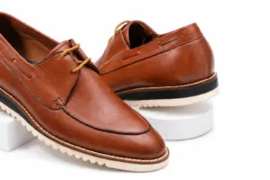 Men's cognac leather Derby shoes with topstitched apron toe panel and tan leather laces