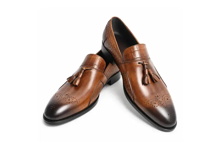 Cognac croc-embossed tassel loafers for men, three-quarter view