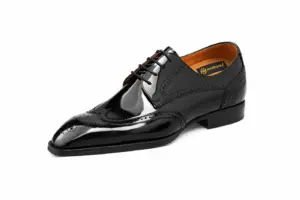 Men's black patent leather longwing brogue Derby shoe, side view