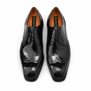 Overhead view of men's black patent longwing brogue Derby shoes with Handsole insoles