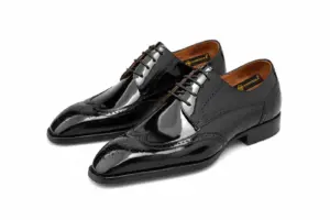 Men's black patent leather longwing brogue Derby shoes, alternate pair angle