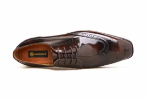 Top view of men's brown patent longwing brogue Derby shoe with Handsole insole