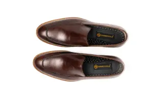 Overhead view of dark brown apron-toe loafers showing the unadorned vamps and branded footbeds