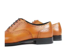 Men's tan leather semi-brogue cap-toe Oxford shoes, rear three quarter view
