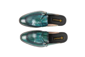 Overhead view of teal patina buckle mules with Vibram soles showing the vamps and HANDSOLE-branded footbeds