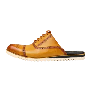 Side profile of a mustard cognac brogue mule with an open heel