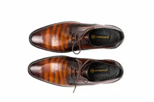 Men's formal croc embossed leather Derby shoes with almond toe and studded black lining, overhead view